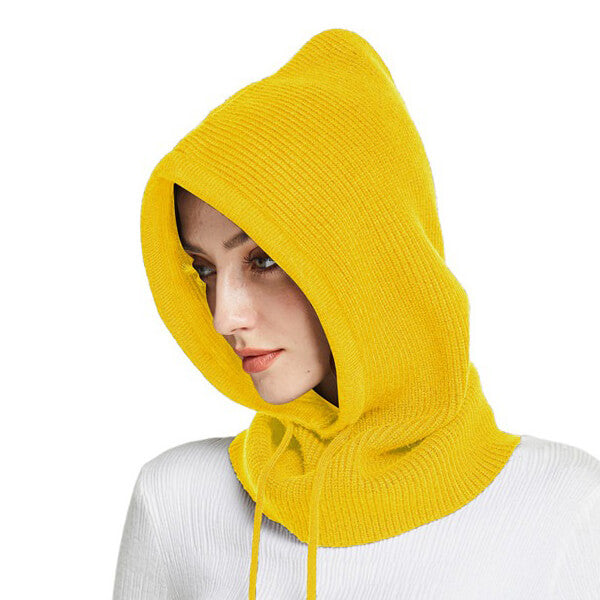 Keltainen hupullinen liivi